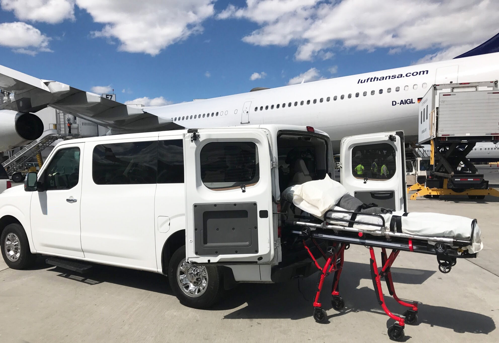 Cross country medical transport team with patient